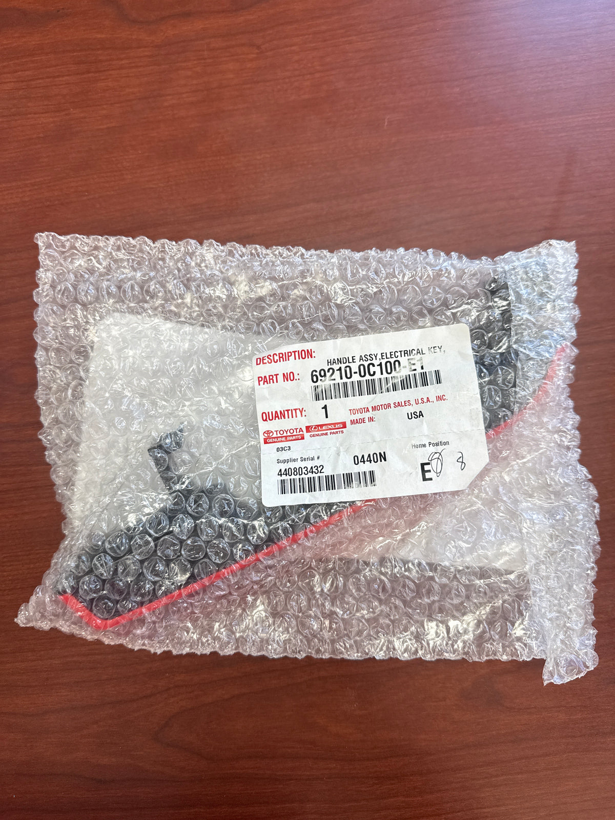 Toyota Genuine #69210-0C100-E1 - Outside Right Hand Front Door Handle Assembly - Solar Octane